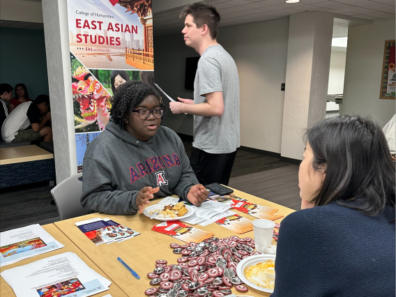 professor talking to student about East Asian studies