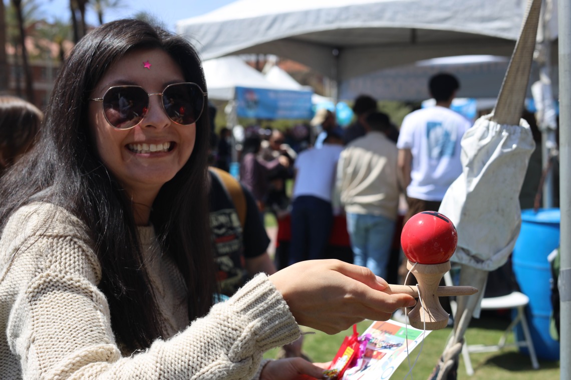 Student playing kendama