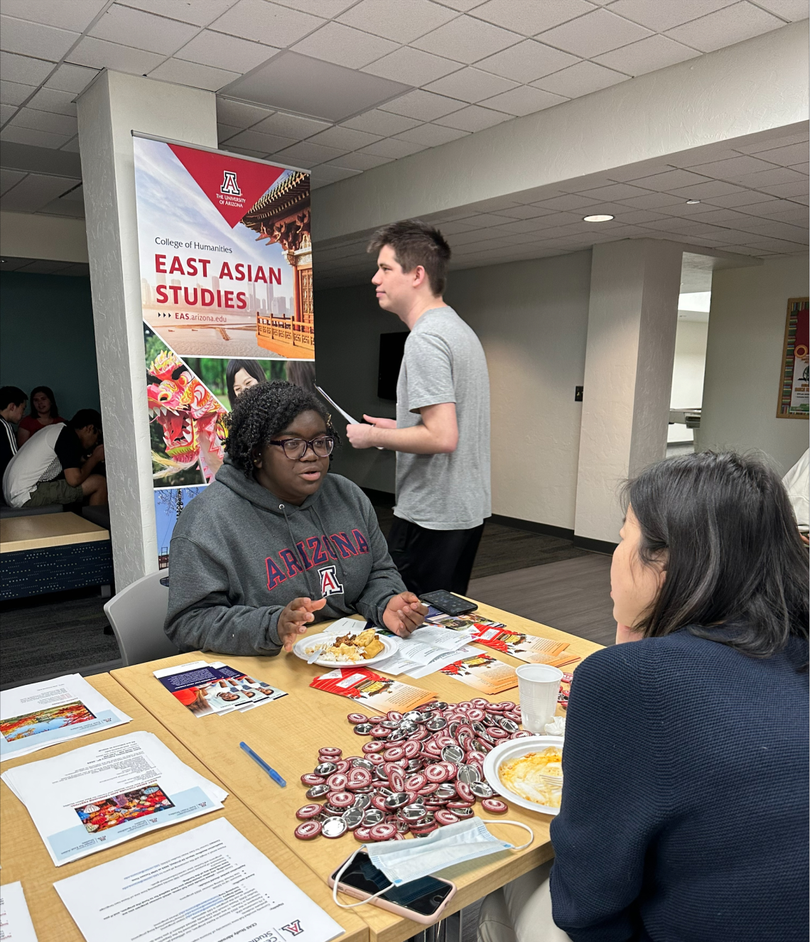 professor talking to student about East Asian studies